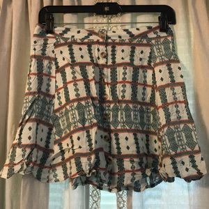 Green and orange printed skirt.